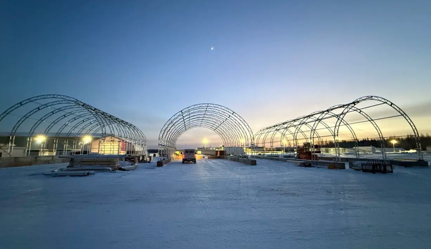 MegaDome steel frame construction at dusk